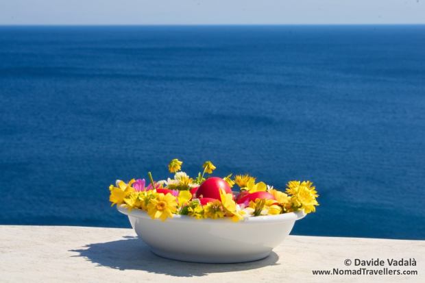 Red painted eggs against the beautiful Aegean sea
