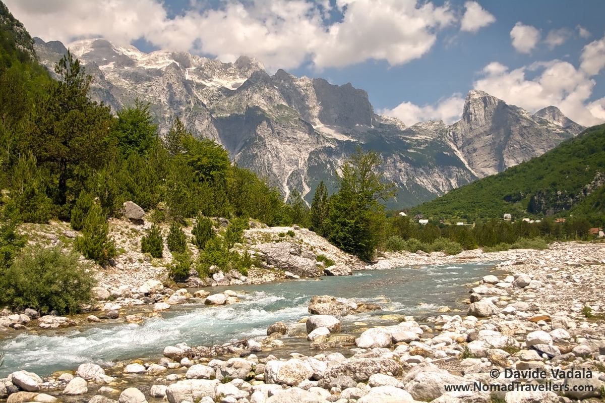 On the left of the river, the road where we took the wrong bus