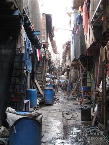 The slum is divided into two sectors: the productive and the residential areas: space is limited and over exploited. 038 Mumbai-Bombay-Dharavi-Slum India 3903