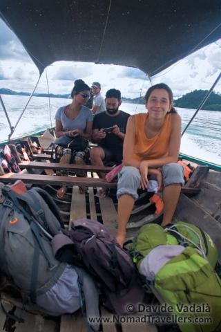 Oti and our adventure's mates on the longtail boat