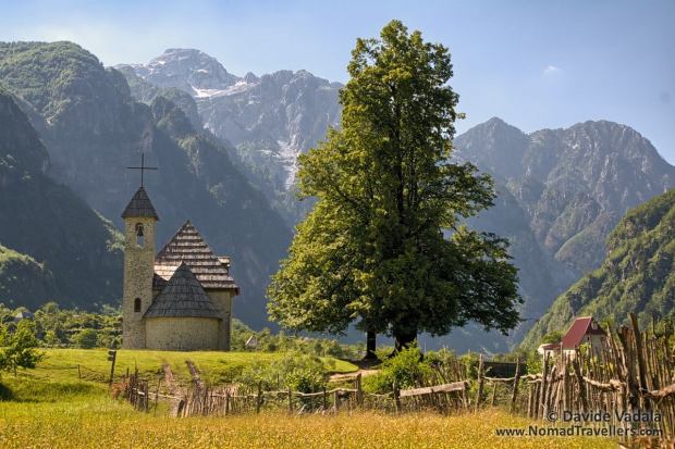 The old church of Thethi surrounded by the Accursed Mountains