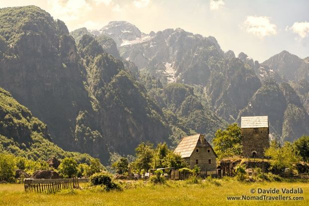 The steep Albanian Alps on the background of the Lock-in tower of Thethi