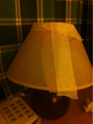 Motel lamp fixed with tape