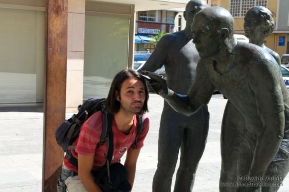 A statue is caddling Davide