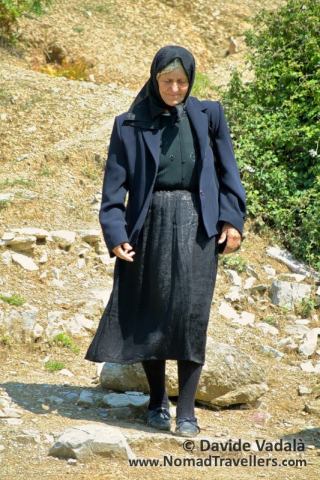 Portrait of a local woman wearing traditional mourning clothes