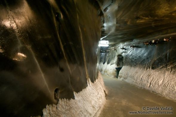 Entrance tunnel with organic form and salt deposit at the bottom