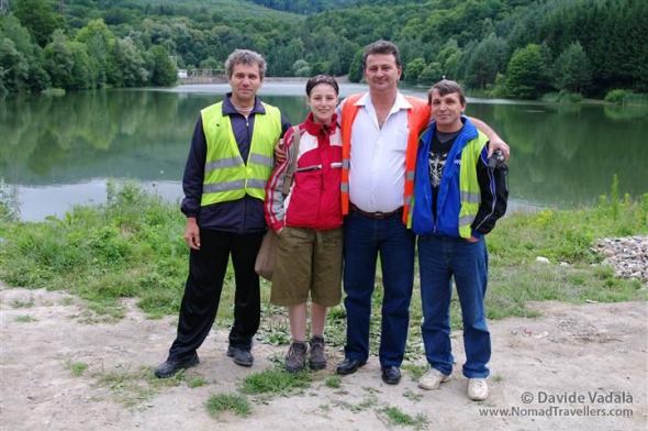  They offer us a coffee in a bar with lake-view and try to communicate despite the language barrier. They are working for the maintenance of the road, and on the back of the truck usually is staying the crew that now is fixing the road not far away, that's why it looks like an immigrant truck! 002-Oravita-Romania-Photo-Story-0121