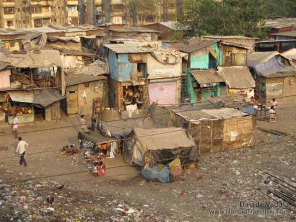 The entrance to Dharavi slum, through a bridge overpassing the railway